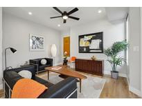 Bright living room with modern décor, hardwood floors, and stylish furnishings at 1286 Raleigh St, Denver, CO 80204