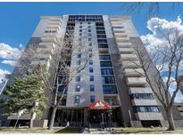 Modern high-rise condominium building featuring a welcoming entrance and private balconies at 2 Adams St # 1507, Denver, CO 80206