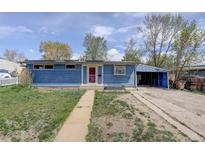 Charming single-story home with blue siding, red door, and driveway with carport and some grass at 41 Cortez St, Denver, CO 80221
