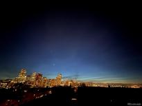 Expansive nighttime skyline view of the city from the home at 907 E 22Nd Ave, Denver, CO 80205