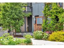 Charming home entrance with a lush garden and stylish architectural details at 2507 Moline St, Aurora, CO 80010