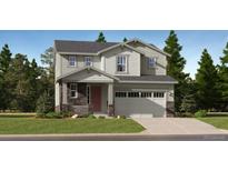 Inviting two-story home showcasing a stone-accented facade, attached two-car garage, and manicured front lawn at 7743 S Cherokee Trl, Centennial, CO 80016