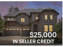 Beautiful multi-story home with stone accents, three-car garage, and a well-manicured lawn at 6877 Northstar Ct, Castle Rock, CO 80108