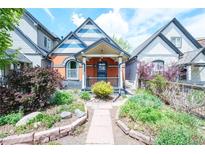 Charming home featuring a landscaped front yard with stone pathway at 4467 W 30Th Ave, Denver, CO 80212