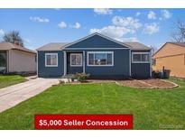 Charming blue house with a well-maintained front yard and $5,000 seller concession at 2285 Fulton St, Aurora, CO 80010