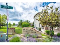 Attractive community sign amidst colorful landscaping, enhancing the neighborhood's welcoming appeal at 15955 E Geddes Dr # 55, Aurora, CO 80016