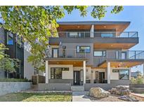 Modern two-story home with gray and white facade and stylish balconies at 4506 N Vrain St, Denver, CO 80212