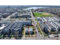 Wide aerial view showing the home's location in a developed neighborhood with mature trees near Sloan's Lake at 1745 Irving St, Denver, CO 80204