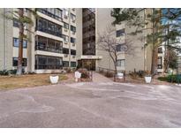 Exterior shot of building with well-maintained landscaping and easy access to the entrance at 13902 E Marina Dr # 111, Aurora, CO 80014