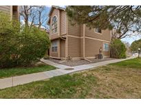 Inviting exterior view of this two-story home with fresh landscaping and a well-maintained lawn at 1770 S Quintero Way, Aurora, CO 80017