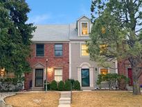 Charming townhomes featuring brick and siding exteriors with well-maintained landscaping and inviting entrances at 5708 E 10Th Ave, Denver, CO 80220