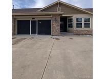 Inviting single-Gathering home featuring a neutral palette, a two-car garage, and low-maintenance landscaping at 15217 Xenia, Thornton, CO 80602