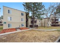 Inviting apartment complex exterior with well-maintained landscaping and mature trees at 9995 E Harvard Ave # 166, Denver, CO 80231