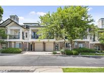Charming townhome featuring an attached garage, balcony, and well-maintained landscaping in a desirable neighborhood at 2121 Enterprise St, Superior, CO 80027