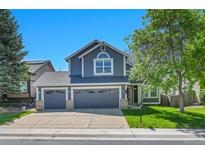 Charming two-story home with a three car garage and landscaped front yard at 9008 W 101St Ave, Broomfield, CO 80021