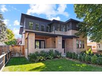 Stunning two-story home with brick facade and modern design at 1170 S Monroe St, Denver, CO 80210