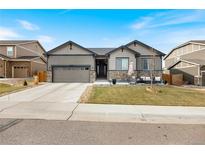 Attractive Ranch style home with a landscaped yard and two-car garage at 12551 Tamarac St, Thornton, CO 80602