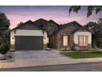 Charming single-Gathering home showcasing stone and siding, a two-car garage, and professionally landscaped grounds at 8864 S Quemoy Ct, Aurora, CO 80016