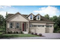 Charming single-Gathering home with a welcoming front porch, well-manicured lawn, and a spacious three-car garage at 3895 Buttongrass Trl, Castle Rock, CO 80108