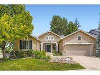 Charming single-Gathering home featuring a well-maintained lawn and inviting front entrance at 10050 Eagle Valley Way, Highlands Ranch, CO 80129