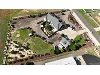 Expansive property with mature landscaping, featuring a custom home and multiple outbuildings at 15280 Bannock St, Broomfield, CO 80023