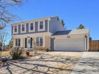 Charming two-story home with a two car garage and great curb appeal on a sunny day at 1081 S Memphis St, Aurora, CO 80017