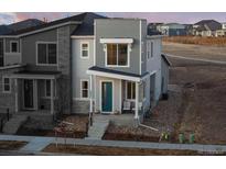 Charming two-story home featuring a modern design, a welcoming front porch, and beautiful curb appeal at 5351 Warrior St, Frederick, CO 80504