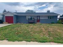 Charming single story home with a red garage door, a large picture window, and a well-maintained but slightly dry front lawn at 2302 S Raleigh St, Denver, CO 80219