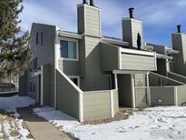 Inviting condo exterior with well-maintained landscaping and charming architectural details at 7933 Countryside Dr # 120, Niwot, CO 80503