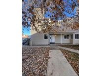Attractive exterior of a condo building with a walkway and landscaping at 2678 S Xanadu Way # C, Aurora, CO 80014
