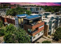 Modern home with solar panels, rooftop deck and beautiful sunset views at 1711 Boulder St, Denver, CO 80211