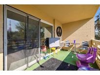 Relaxing balcony with seating and a view at 750 S Clinton St # 6B, Denver, CO 80247