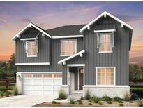 Charming two-story home with gray siding, white trim, and an attached two-car garage at 4334 Ridgewalk Pt, Castle Rock, CO 80108