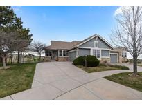 Charming single-Gathering home boasts a well-maintained lawn and inviting curb appeal at 7713 S Zante Ct, Aurora, CO 80016
