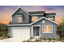 Charming two-story home with neutral siding, white trim, and a two-car garage at 3639 Recess Ln, Castle Rock, CO 80108
