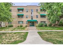 Attractive multi-Gathering building featuring awnings, landscaping, and a welcoming entrance at 2100 N Franklin St # 20, Denver, CO 80205