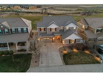 Stunning two-story home with well-maintained landscaping and a welcoming stone facade at 1609 S Catawba Cir, Aurora, CO 80018