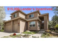 Inviting two-story home with a well-manicured lawn and a two-car garage, plus $15,000 in lender incentives at 6584 S Sedalia St, Aurora, CO 80016