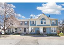 Charming exterior view of townhomes with attractive paint, siding and curb appeal at 1620 S Ivory Cir # C, Aurora, CO 80017