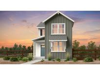 Charming two-story home with gray siding, white trim, and a welcoming blue front door at 14847 Arbor W Blvd, Thornton, CO 80602