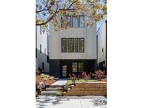 Contemporary two-story home featuring a modern design with a beautifully landscaped front yard at 2738 N Clay St, Denver, CO 80211