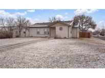 Charming single-story home with a well-maintained lawn and sidewalk access, nestled on a corner lot at 3390 S Elm St, Denver, CO 80222