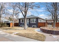 Charming single-Gathering home boasting a well-maintained front yard and a welcoming entrance at 6010 S Bemis St, Littleton, CO 80120