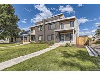 Modern two-story home with a landscaped lawn and walkway at 2008 Galapago, Denver, CO 80223