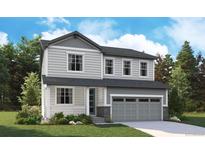 Charming two-story home with gray siding, large windows, and a two-car garage at 2644 Simpson Ln, Erie, CO 80026