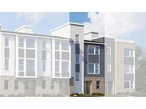 New construction townhome with modern design, gray siding, stone accents, and large windows at 14269 Currant St, Broomfield, CO 80020