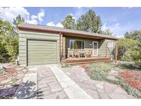 Charming ranch home with a spacious deck and landscaped yard at 2825 Elm Ave, Boulder, CO 80305