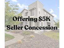 Charming two-story home with stone accents and well-maintained landscaping; seller concession of $5k is offered at 23615 E 5Th Pl, Aurora, CO 80018