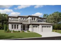 Beautiful new construction two-story home with stone accents, attached two-car garage, and manicured lawn at 1598 Green Fern Pt, Castle Rock, CO 80104