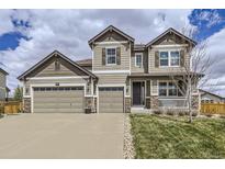 Charming two-story home with a three-car garage and stone accents at 3508 Silverado Cir, Frederick, CO 80516